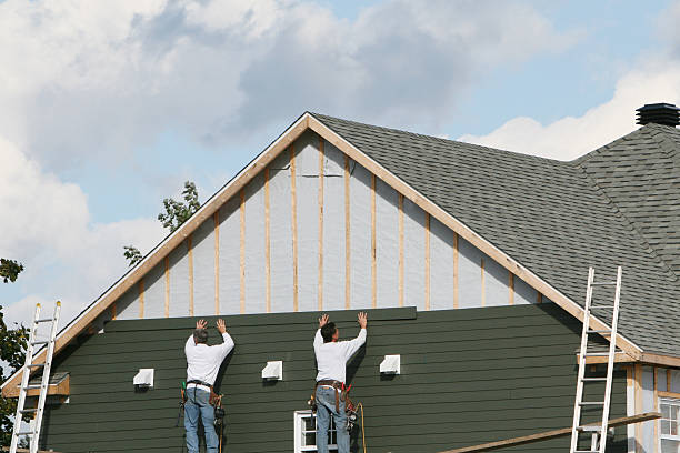 Professional Vinyl Siding technician working in Westminster, TX